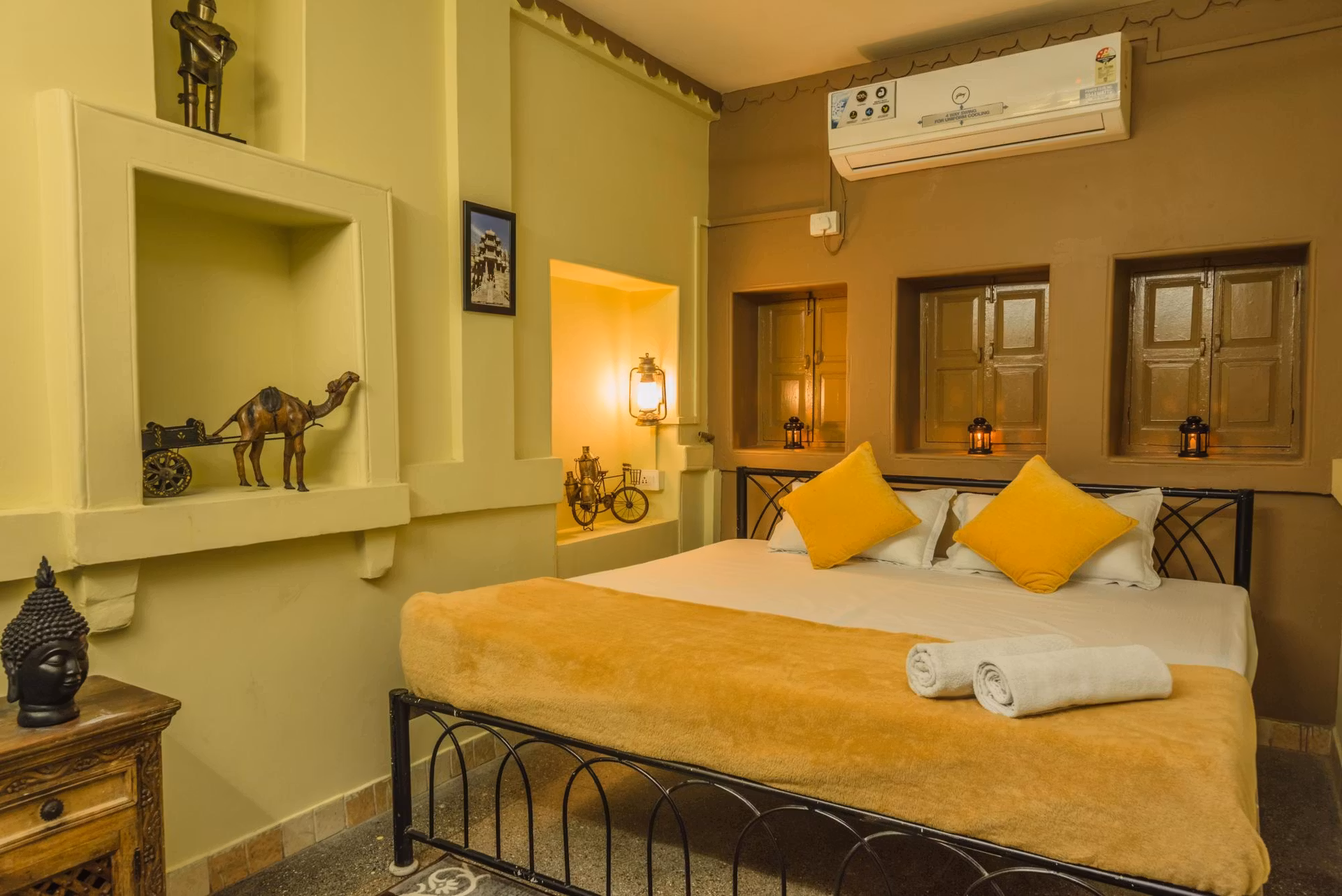 The ornated and colourful private room with a comfy bed.